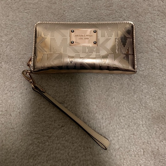 Michael Kors Handbags - Rose Gold Michael Kors Wristlet/Wallet